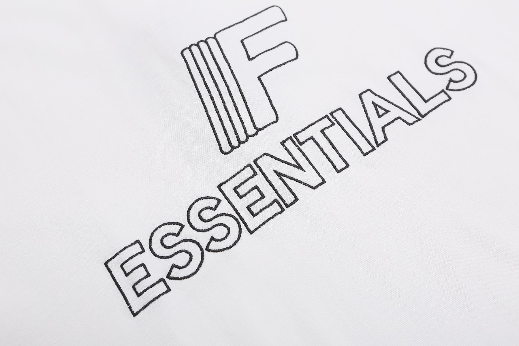 ESSENTIALS F-Letter Embroidered Graphic T-Shirt — fabric_closeup