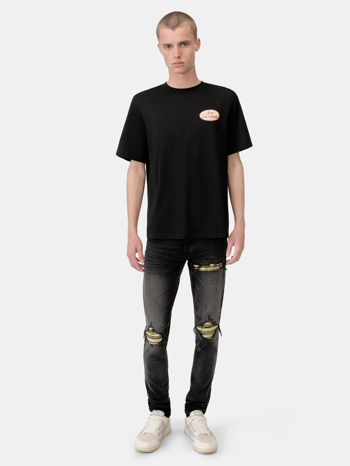 AMIRI Multi-Patch Back Graphic T-Shirt — model