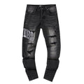 AMIRI Distressed Washed Black Graphic Jeans — hero